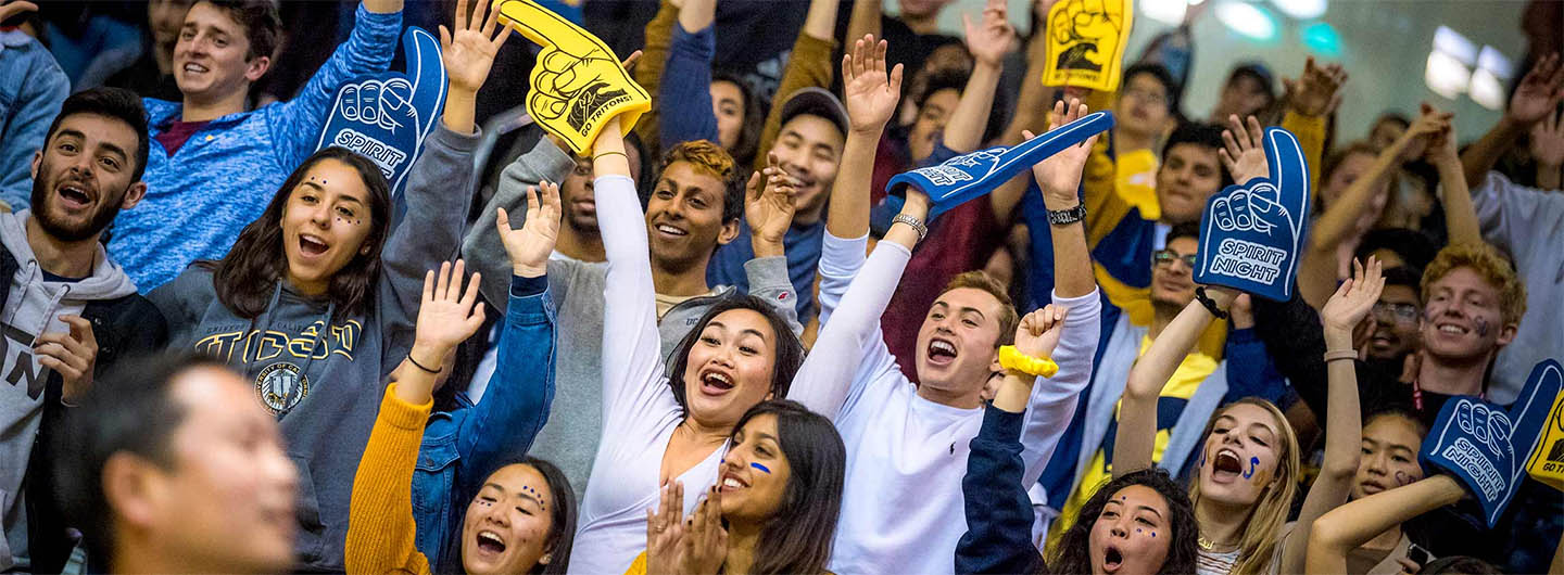 UC San Diego students sport blue-and-gold foam fingers on Triton Spirit Night