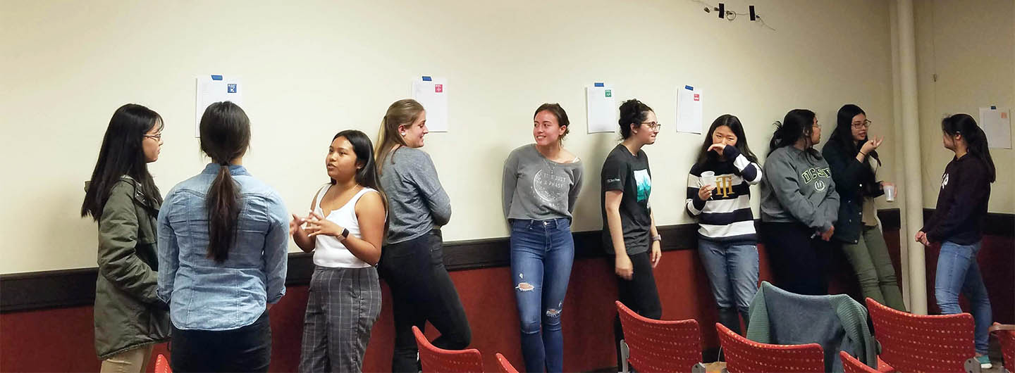 UC San Diego students sit in a circle attending a CSI-Communication and Leadership workshop