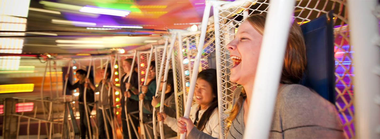 UC San Diego students on a carnival ride at Hullabaloo