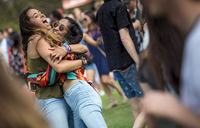 UC San Diego students hug it out at the Sun God Festival - photo by Erik Jepsen, UC San Diego Publications